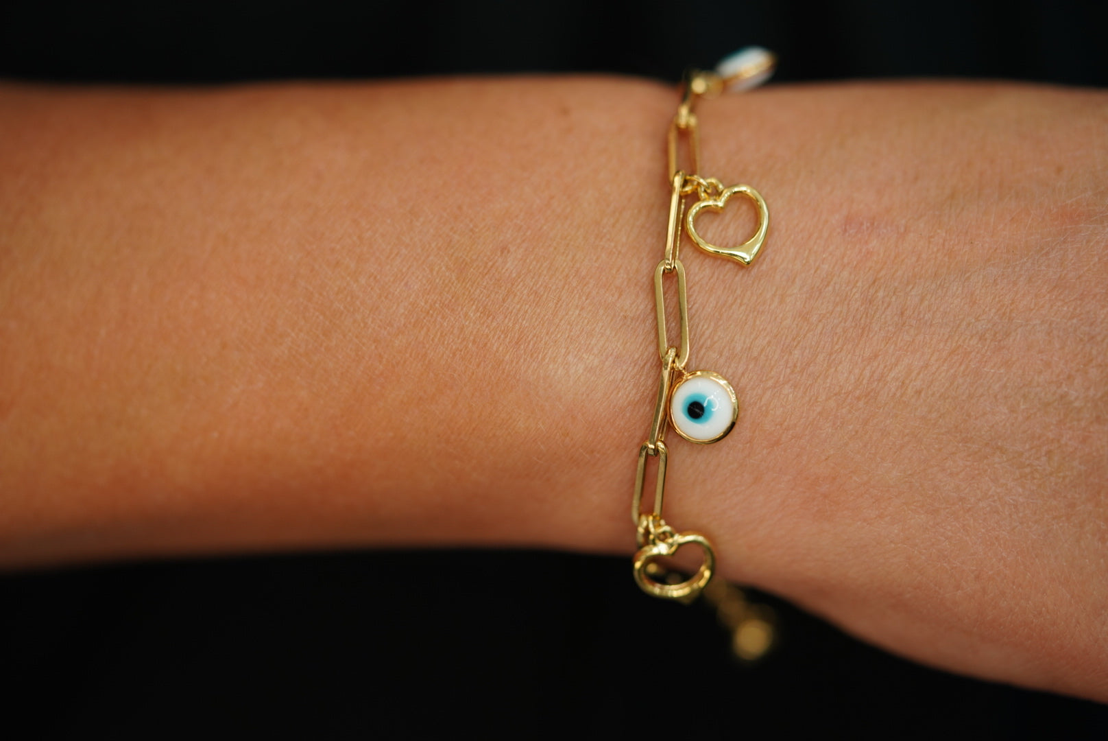 14k  Heart and Blue Eye pendants in Clip Bracelet