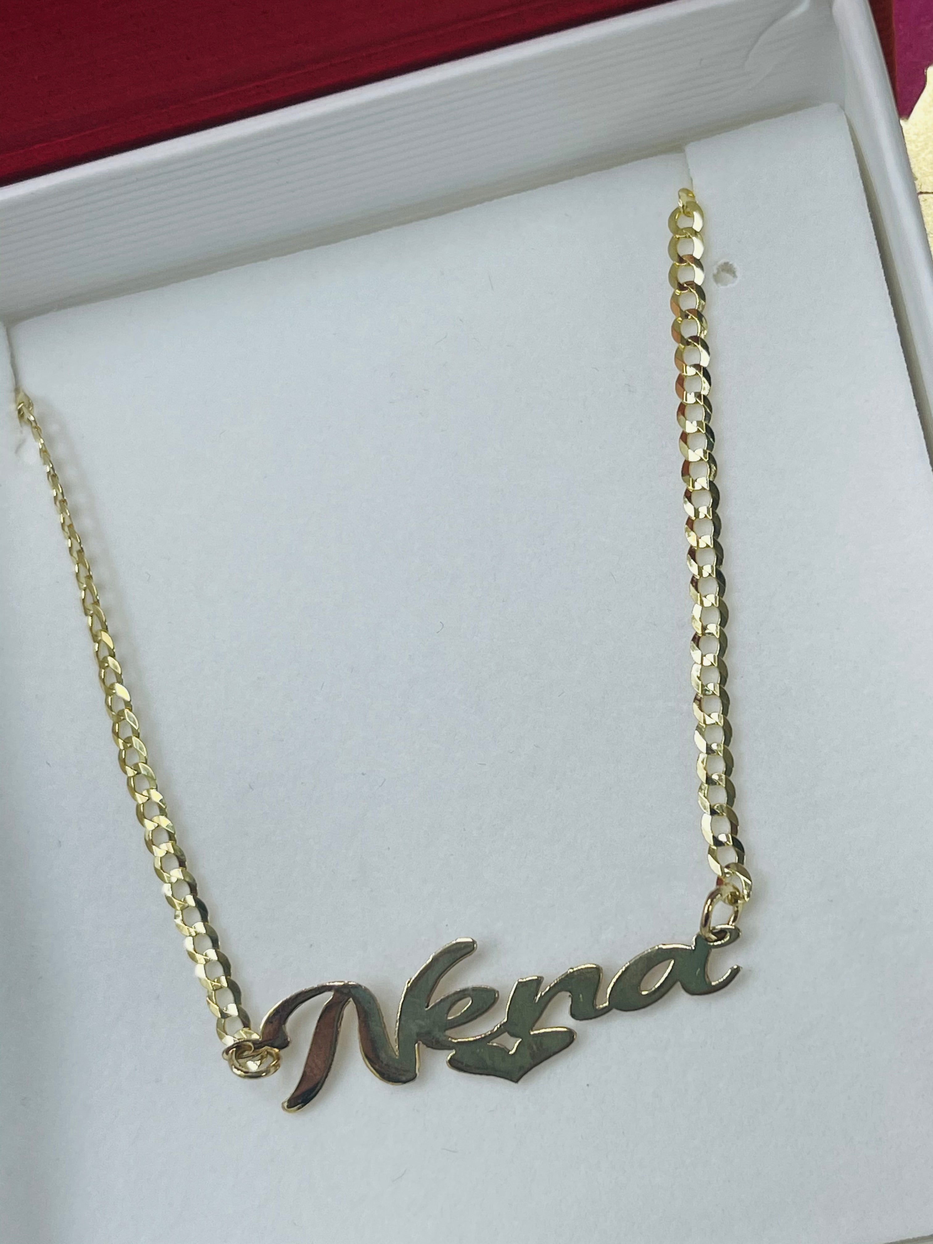 Dije y cadena nombre 14k