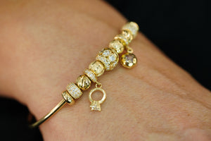 14k Ring and Flower Charms Bracelet